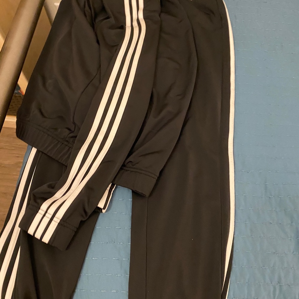 Adidas 3 stripes track suit in black... On hold